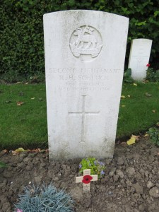 The grave of Roger Schunck in Ypres Town Cemetery.  Photgraphed for 'Marching in Memory' for Combat Stress, July 2015